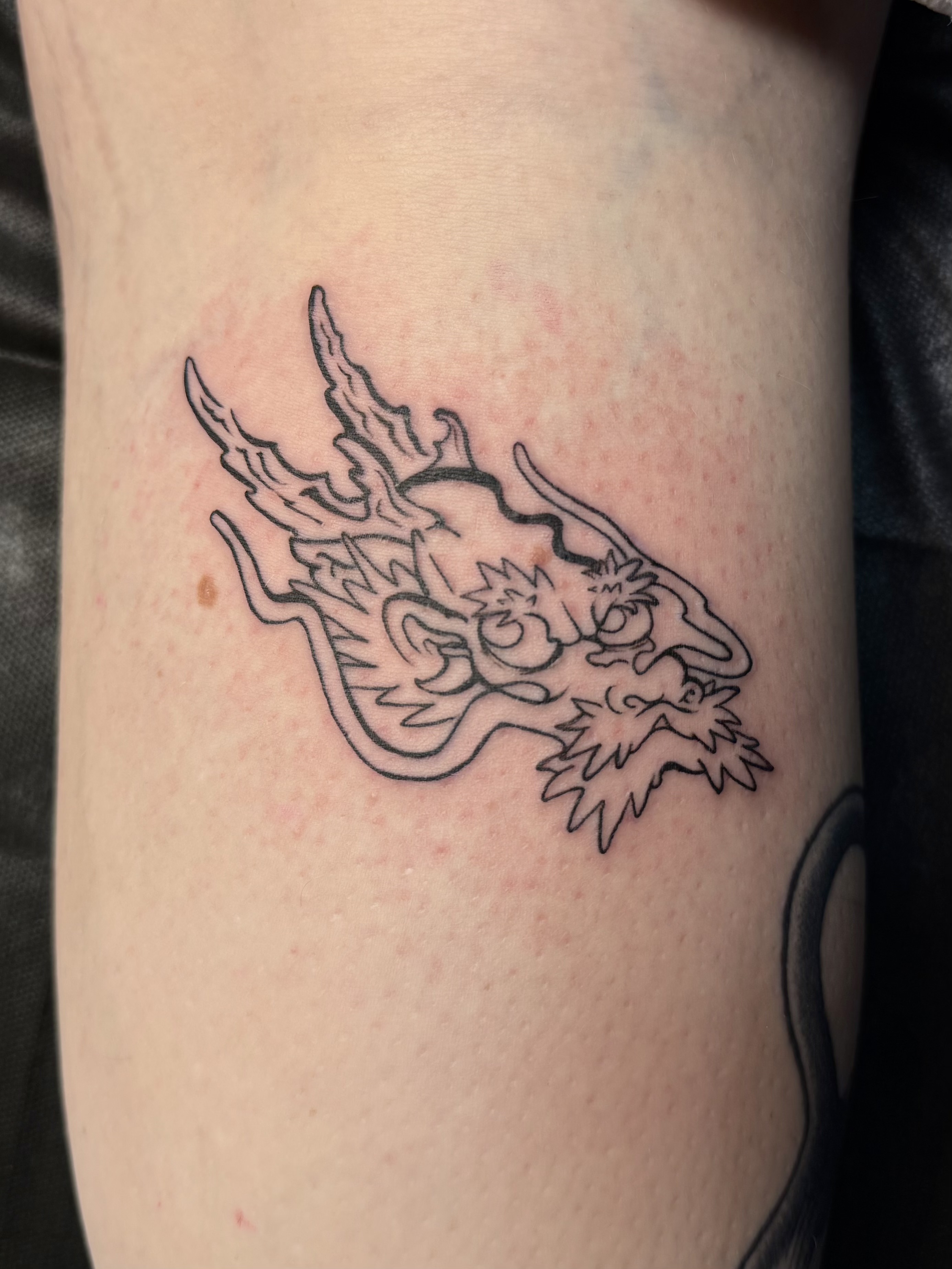 Neo-traditional tattoo by Isaiah