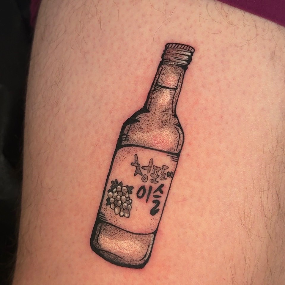 Detailed black and grey tattoo by Isaiah