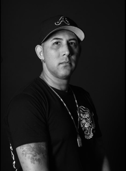 Michael tattoo artist portrait at Horimu Ink Studio Houston Texas specializing in Sak Yant hand-poked tattoos
