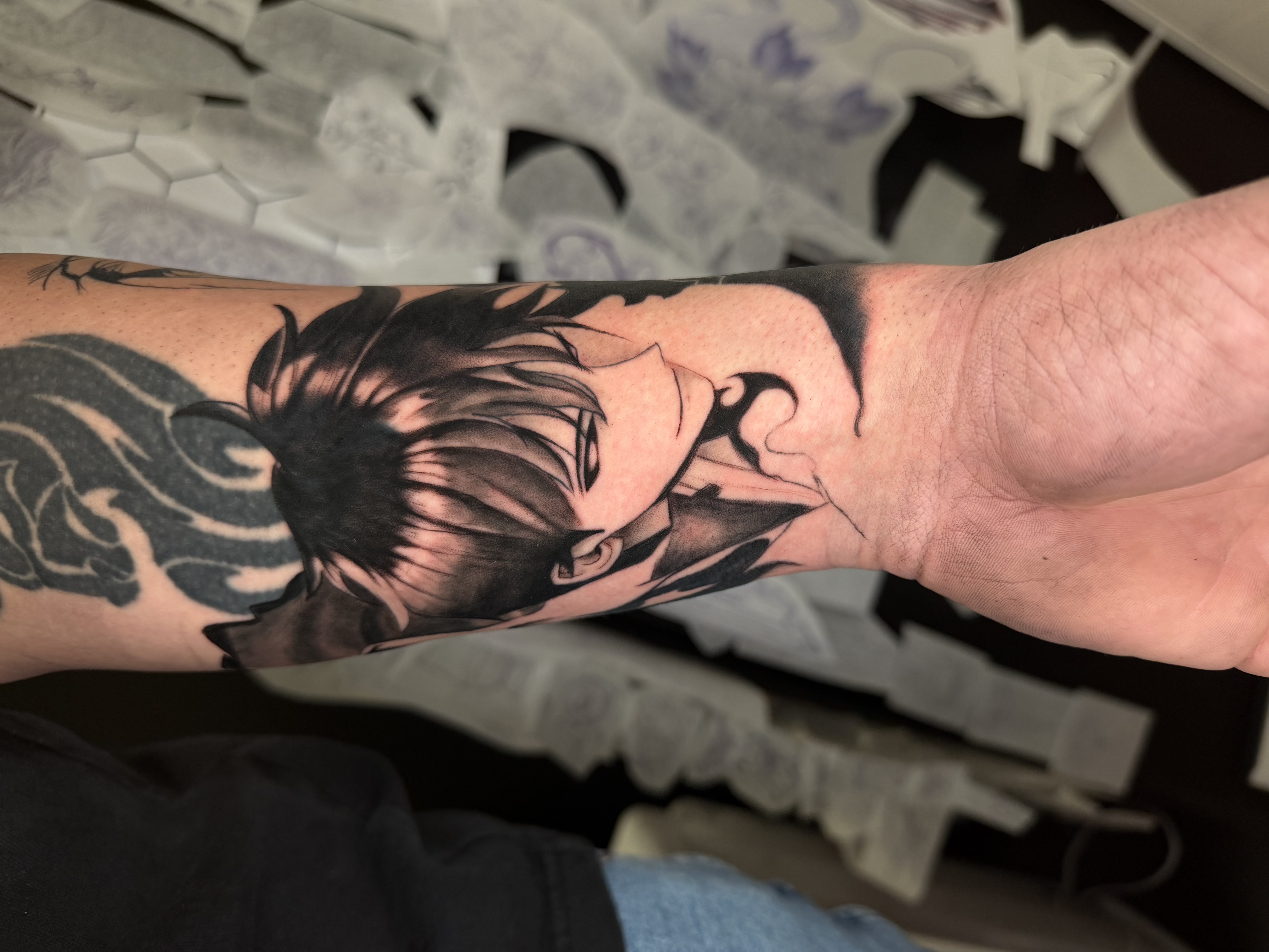 Black and grey tattoo composition by Nguyen